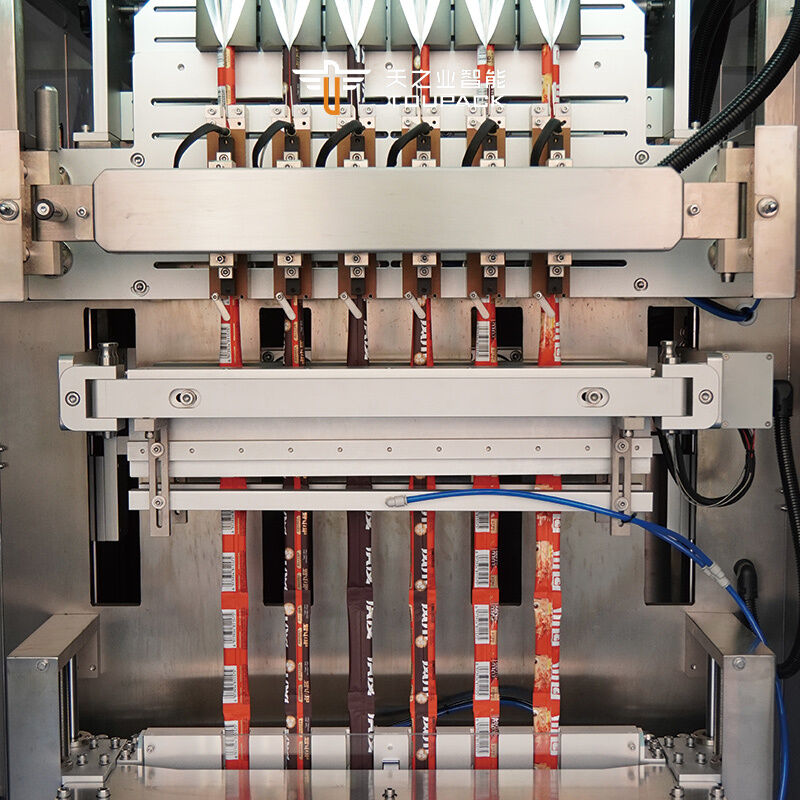 Automatic Multi Lane 50ml 100ml Liquid Sachet Fruit Juice Ice Lolly Pop Jelly Stick Strip Sachet Packing Machine