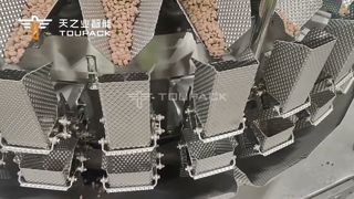 ペットフード包装ソリューション | 32頭多頭秤+横型フォームフィルシール